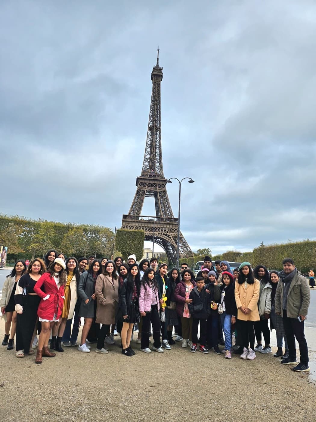 Students from India together in front of the Eiffel Tower in Paris during the immersion programme